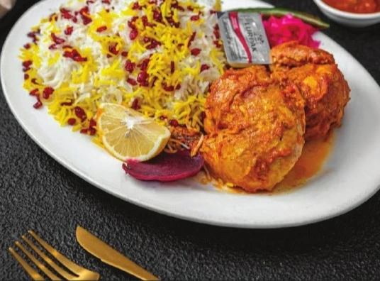 دجاج مع أرز رمان